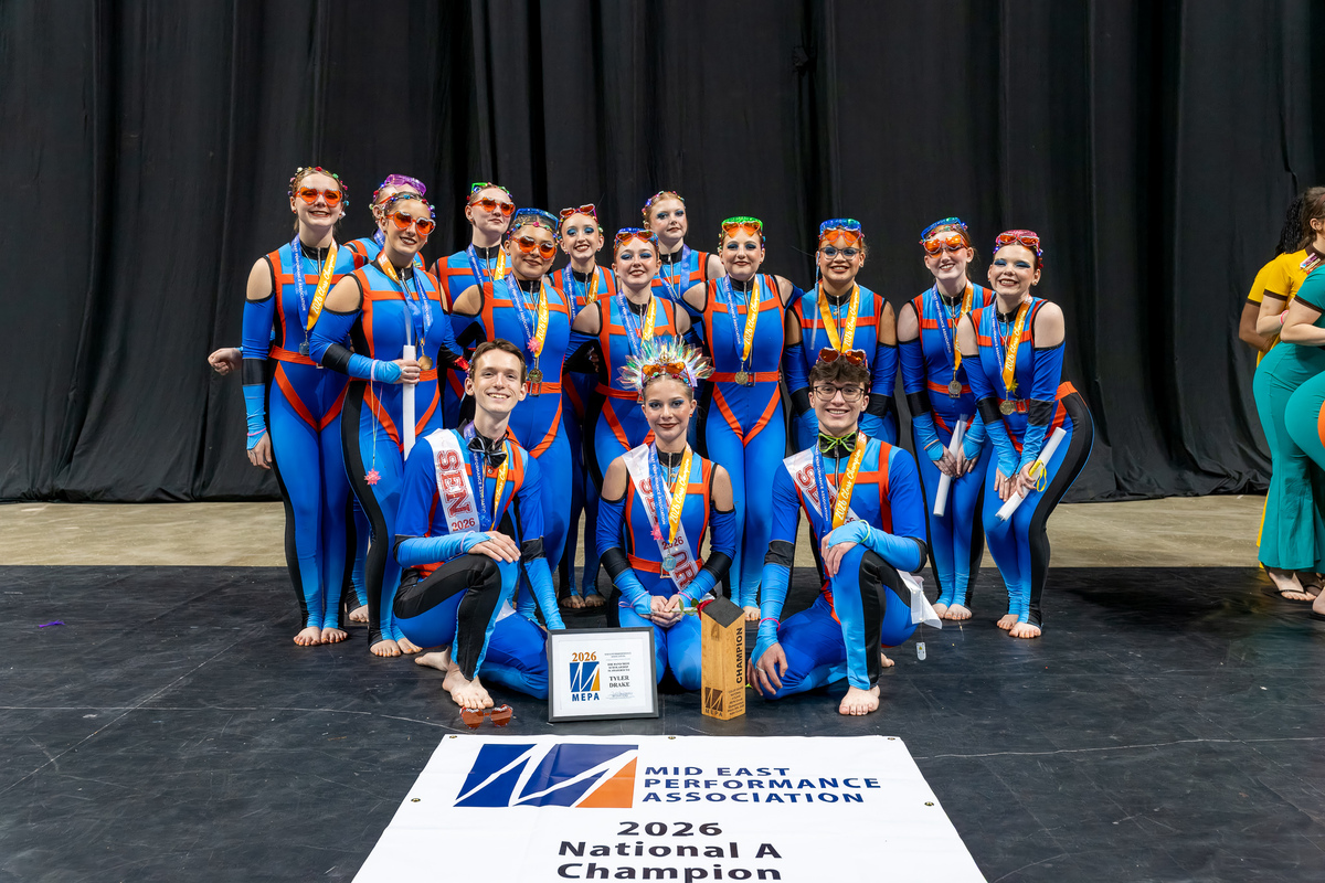 Franklin High School Color Guard with a banner showing their championship status